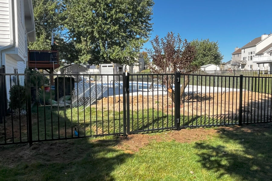 Black aluminum fence and gate at a Grand Rapids residential property
