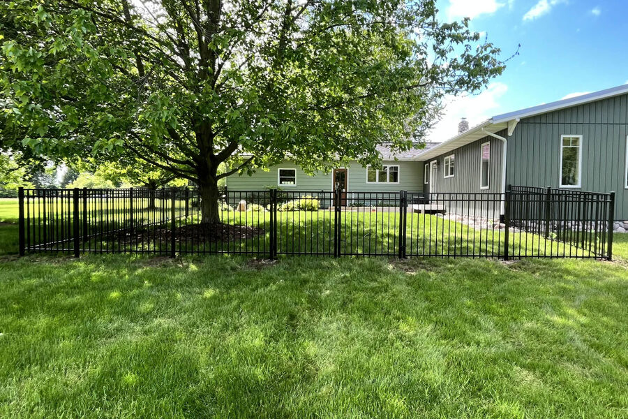 Cedar privacy fence surrounding a Grand Rapids backyard