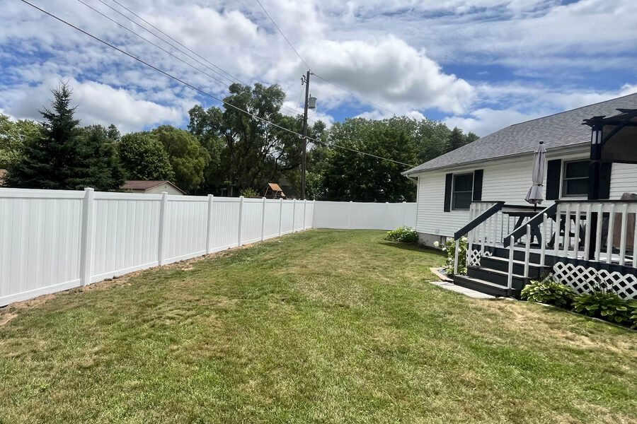 Cedar privacy fence surrounding a Grand Rapids backyard
