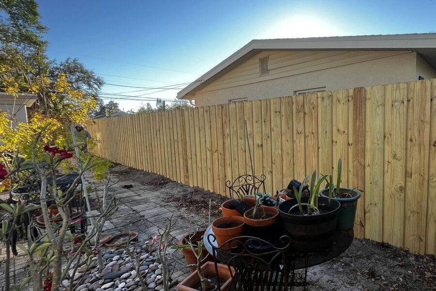 Wood privacy fence along a Grand Rapids residential property