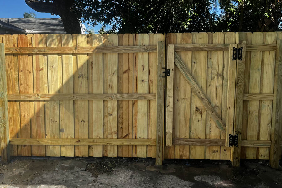 Residential wood privacy fence in a Grand Rapids backyard