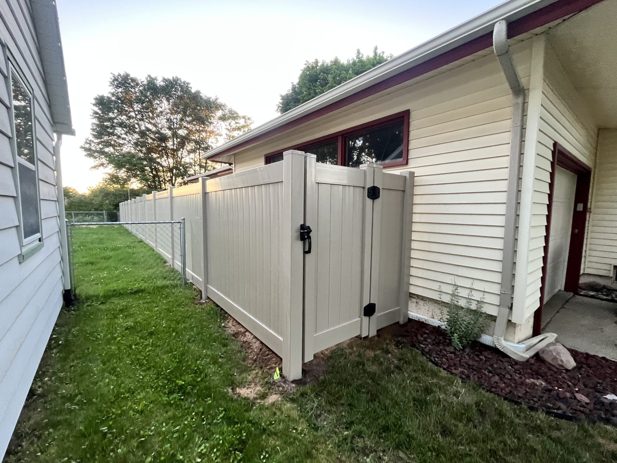 Cedar privacy fence surrounding a Grand Rapids backyard