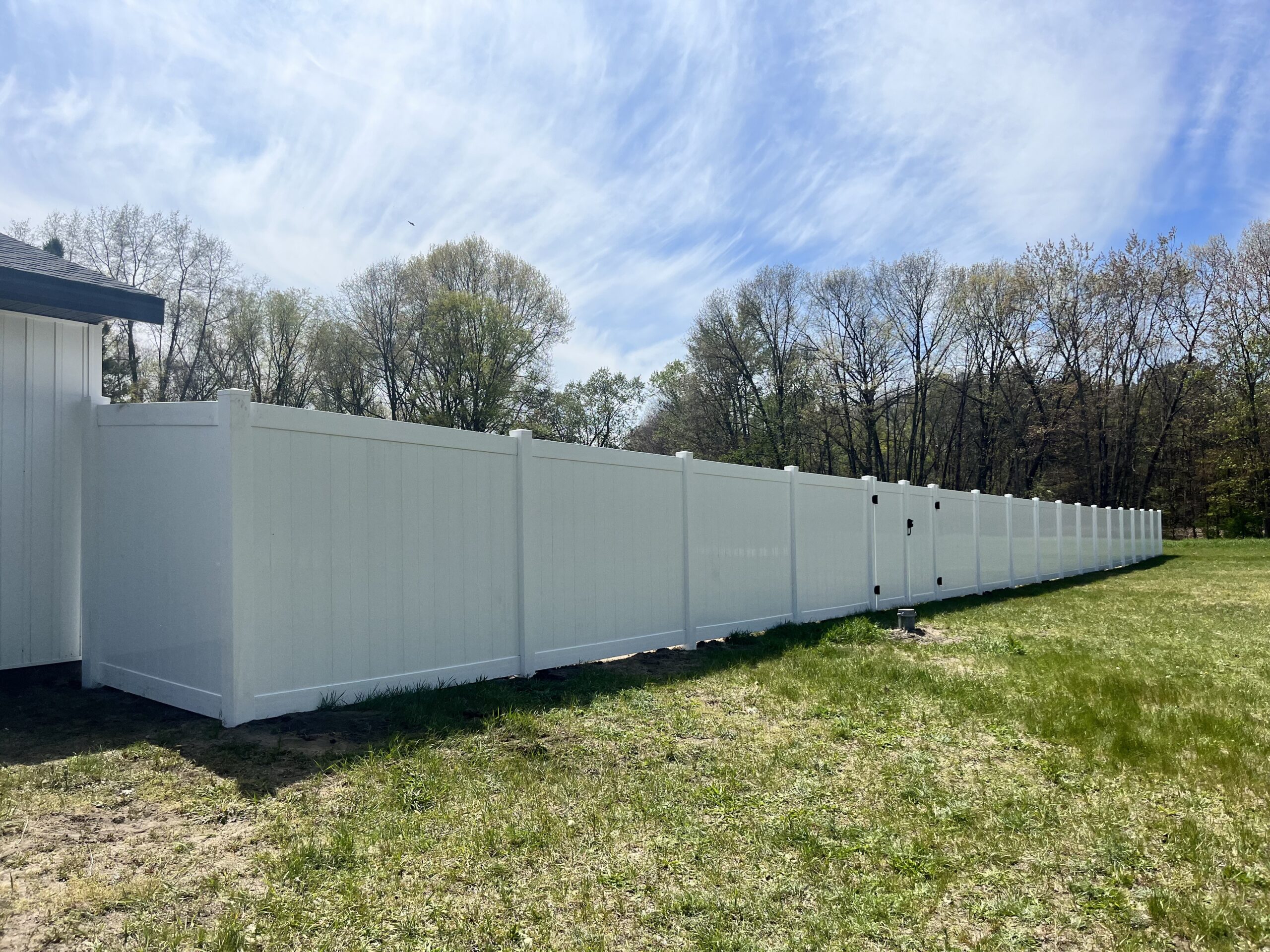 White vinyl privacy fence in West Michigan